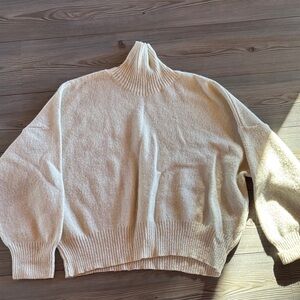 Nonna Lietta cream raw wool turtleneck